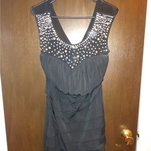 Deb brand black dress with sheer sequin front and sheer back. Size 1X.
